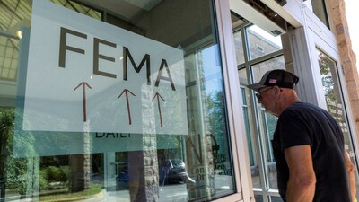 A resident enters a FEMA's improvised station to attend claims by local residents affected by floods following the passing of Hurricane Helene, in Marion, North Carolina, U.S. (REUTERS)