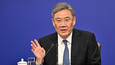 Wang urged France to push the European Commission to work with China to create conditions for expanding cooperation. (AFP) Wang urged France to push the European Commission to work with China to create conditions for expanding cooperation. (AFP)