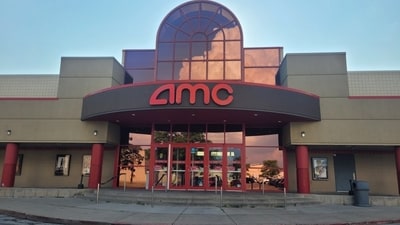 AMC, America's largest cinema chain, is finally saying yes to ads before films play in theatres. AMC, America's largest cinema chain, is finally saying yes to ads before films play in theatres.