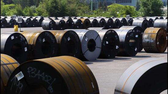 Coils of steel are seen in a yard outside one of ArcelorMittal Dofasco's steel manufacturing buildings in Hamilton, Ontario, Canada. (AFP)