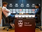 Magnus Carlsen from Norway, left, and Gukesh Dommaraju from India during their game. Magnus Carlsen from Norway, left, and Gukesh Dommaraju from India during their game.
