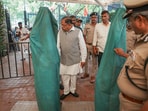 Karnataka Home Minister G Parameshwara with Bengaluru City Commissioner of Police B Dayananda and other police personnel during an inspection after the stampede near the Chinnaswamy stadium that claimed 11 lives, in Bengaluru
