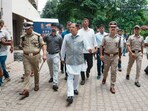 Karnataka Home Minister G Parameshwara with Bengaluru City Commissioner of Police B Dayananda and other police personnel during an inspection after the stampede near the Chinnaswamy stadium. Karnataka Home Minister G Parameshwara with Bengaluru City Commissioner of Police B Dayananda and other police personnel during an inspection after the stampede near the Chinnaswamy stadium.