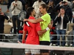 Serbia's Novak Djokovic shakes hands with Germany's Alexander Zverev.