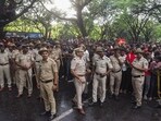 Police stand in front of crowds as fans gather outside the M. Chinnaswamy Stadium to celebrate Royal Challengers Bengaluru winning the Indian Premier League (IPL). Police stand in front of crowds as fans gather outside the M. Chinnaswamy Stadium to celebrate Royal Challengers Bengaluru winning the Indian Premier League (IPL).