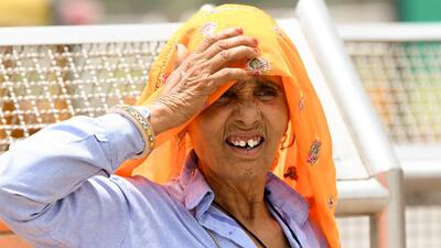 A woman covers her face with a cloth to protect herself from scorching heat on a hot summer day in New Delhi. (ANI Photo) A woman covers her face with a cloth to protect herself from scorching heat on a hot summer day in New Delhi. (ANI Photo)
