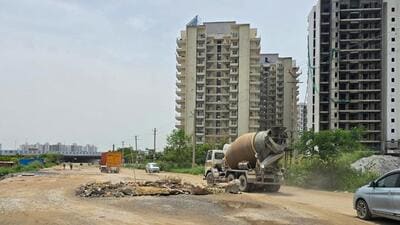According to locals, commuters are forced to go through the drain surface as a portion of a revenue road in front of an under-construction power substation in Sector 99 is damaged and can’t be used for commuting. (Parveen Kumar/HT Photo) According to locals, commuters are forced to go through the drain surface as a portion of a revenue road in front of an under-construction power substation in Sector 99 is damaged and can’t be used for commuting. (Parveen Kumar/HT Photo)