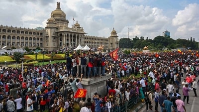 Thousands gather outside the Vidhana Soudha to celebrate with Royal Challengers Bengaluru players winning the IPL. (AFP) Thousands gather outside the Vidhana Soudha to celebrate with Royal Challengers Bengaluru players winning the IPL. (AFP)
