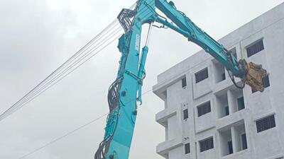 PMRDA razing the illegal structure. (HT PHOTO)
