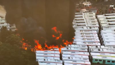 Thick black smoke billows as 20 SEPTA buses engulfed in flames at a Philadelphia bus depot (X) Thick black smoke billows as 20 SEPTA buses engulfed in flames at a Philadelphia bus depot (X)