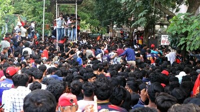 Fans throng near the M. Chinnaswamy Stadium in Bengaluru on June 4, 2025, to celebrate a day after the RCB's victory. (AFP) Fans throng near the M. Chinnaswamy Stadium in Bengaluru on June 4, 2025, to celebrate a day after the RCB's victory. (AFP)