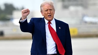 President Donald Trump issued travel bans for 12 countries on Wednesday (AFP)