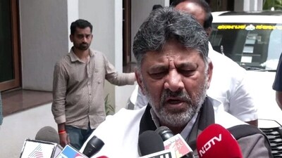 Karnataka deputy chief minister DK Shivakumar gets emotional as he addresses the media on Thursday. (ANI)