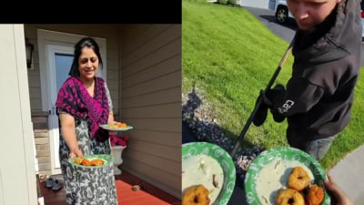 An Indian woman was seen offering vada and chutney to construction workers in the US (Instagram/@sealcoatinguys) An Indian woman was seen offering vada and chutney to construction workers in the US (Instagram/@sealcoatinguys)