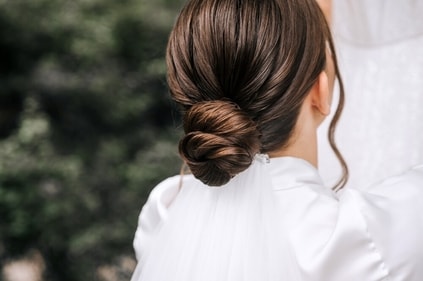 Twisted buns not only look elegant but protect your hair. (Shutterstock) Twisted buns not only look elegant but protect your hair. (Shutterstock)