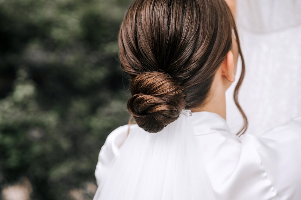 Twisted buns not only look elegant but protect your hair.(Shutterstock)