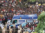 An ambulance arrives at the M Chinnaswamy Stadium as fans gather to celebrate Royal Challengers Bengaluru cricketers, winners of the Indian Premier League, in Bengaluru. An ambulance arrives at the M Chinnaswamy Stadium as fans gather to celebrate Royal Challengers Bengaluru cricketers, winners of the Indian Premier League, in Bengaluru.