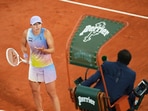 Poland's Iga Swiatek speaks to the chair umpire. Poland's Iga Swiatek speaks to the chair umpire.