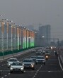 The six-lane Urban Extension Road-2 (UER-2), planned as Delhi’s third Ring Road, is set to open by August, said officials. (Hindustan Times) The six-lane Urban Extension Road-2 (UER-2), planned as Delhi’s third Ring Road, is set to open by August, said officials. (Hindustan Times)