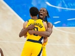 Indiana Pacers forward Aaron Nesmith (23) and guard Tyrese Haliburton celebrate after a play against the Oklahoma City Thunder