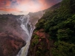 Goa during the monsoon is replete with picturesque waterfalls, surrounded by vivid greenery. Goa during the monsoon is replete with picturesque waterfalls, surrounded by vivid greenery.