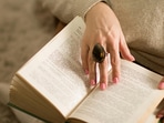 He had once promised her that if he ever won an award or published a book, he would shower her with gifts.