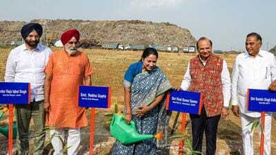 CM Rekha Gupta and LG VK Saxena during the launch bamboo plantation drive at Okhla Landfill site in New Delhi. (RAJ K RAJ /HT PHOTO) CM Rekha Gupta and LG VK Saxena during the launch bamboo plantation drive at Okhla Landfill site in New Delhi. (RAJ K RAJ /HT PHOTO)