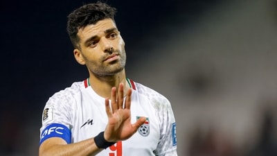 Iran's forward #09 Mehdi Taremi greets the fans ater the 2026 FIFA World Cup Asian Qualifier football match between Qatar and Iran at Jassim Bin Hamad Stadium in Doha on June 5, 2025. (AFP) Iran's forward #09 Mehdi Taremi greets the fans ater the 2026 FIFA World Cup Asian Qualifier football match between Qatar and Iran at Jassim Bin Hamad Stadium in Doha on June 5, 2025. (AFP)