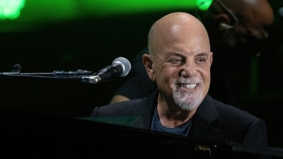 US musician Billy Joel performs during a concert at the Formula One Grand Prix at Circuit of the Americas in Austin, Texas on October 23, 2021. (AFP) US musician Billy Joel performs during a concert at the Formula One Grand Prix at Circuit of the Americas in Austin, Texas on October 23, 2021. (AFP)