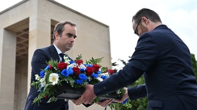 French Defence Minister Sébastien Lecornu laid a wreath at the American Cemetery in Colleville-sur-Mer on June 6, 2025, to mark the 81st anniversary of the D-Day landings. (Photo by Lou BENOIST / AFP) (AFP) French Defence Minister Sébastien Lecornu laid a wreath at the American Cemetery in Colleville-sur-Mer on June 6, 2025, to mark the 81st anniversary of the D-Day landings. (Photo by Lou BENOIST / AFP) (AFP)