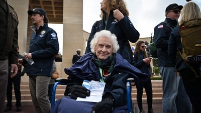 In frame, former U.S. Army nurse Betty Huffman-Rosevear looks on, ahead of a memorial ceremony marking the 81st anniversary of the D-Day landings. Held at the American Cemetery in Colleville-sur-Mer, Normandy, on June 6, 2025. (Photo by Lou BENOIST / AFP) (AFP) In frame, former U.S. Army nurse Betty Huffman-Rosevear looks on, ahead of a memorial ceremony marking the 81st anniversary of the D-Day landings. Held at the American Cemetery in Colleville-sur-Mer, Normandy, on June 6, 2025. (Photo by Lou BENOIST / AFP) (AFP)