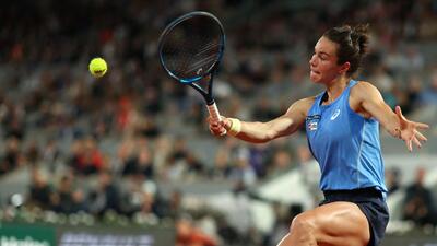 France's Lois Boisson plays a backhand return to US’ Coco Gauff during their French Open semi-final. (AFP) France's Lois Boisson plays a backhand return to US’ Coco Gauff during their French Open semi-final. (AFP)