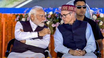 Prime Minister Narendra Modi with Jammu and Kashmir chief minister Omar Abdullah during the foundation stone laying and inauguration of various development projects at Katra, in Reasi district, on Friday (PTI) Prime Minister Narendra Modi with Jammu and Kashmir chief minister Omar Abdullah during the foundation stone laying and inauguration of various development projects at Katra, in Reasi district, on Friday (PTI)