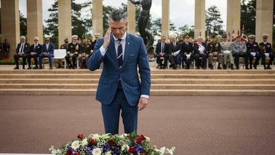 U.S. Defense Secretary Pete Hegseth lays a wreath of flowers during a ceremony at the US cemetery to commemorate the 81st anniversary of the D-Day landings, Friday, June 6, 2025 in Colleville-sur-Mer, Normandy. (AP) U.S. Defense Secretary Pete Hegseth lays a wreath of flowers during a ceremony at the US cemetery to commemorate the 81st anniversary of the D-Day landings, Friday, June 6, 2025 in Colleville-sur-Mer, Normandy. (AP)