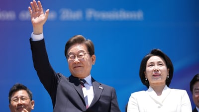 New South Korean President Lee Jae-myung and his wife Kim Hye-kyung at the National Assembly in Seoul on June 4. (REUTERS)