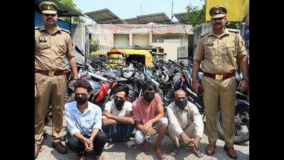 The accused with the vehicles recovered from them. (Sunil Ghosh/HT photo) The accused with the vehicles recovered from them. (Sunil Ghosh/HT photo)