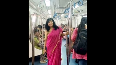 Dressed in a pink saree, Revathi Kamath shared a picture of herself inside the Metro's women's coach. (Instagram/revathikamath.world) Dressed in a pink saree, Revathi Kamath shared a picture of herself inside the Metro's women's coach. (Instagram/revathikamath.world)