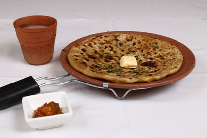 Aloo paratha and chai combination is warm and comforting. (Shutterstock) Aloo paratha and chai combination is warm and comforting. (Shutterstock)