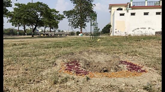 An empty pit with no sapling at Laxman Mela Ground on Friday morning. (Deepak Gupta/HT)