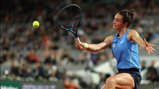 France's Lois Boisson plays a backhand return to US’ Coco Gauff during their French Open semi-final. (AFP)
