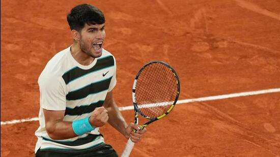 Spain's Carlos Alcaraz reacts against Italy's Lorenzo Musetti during their French Open semi-final. (AFP)
