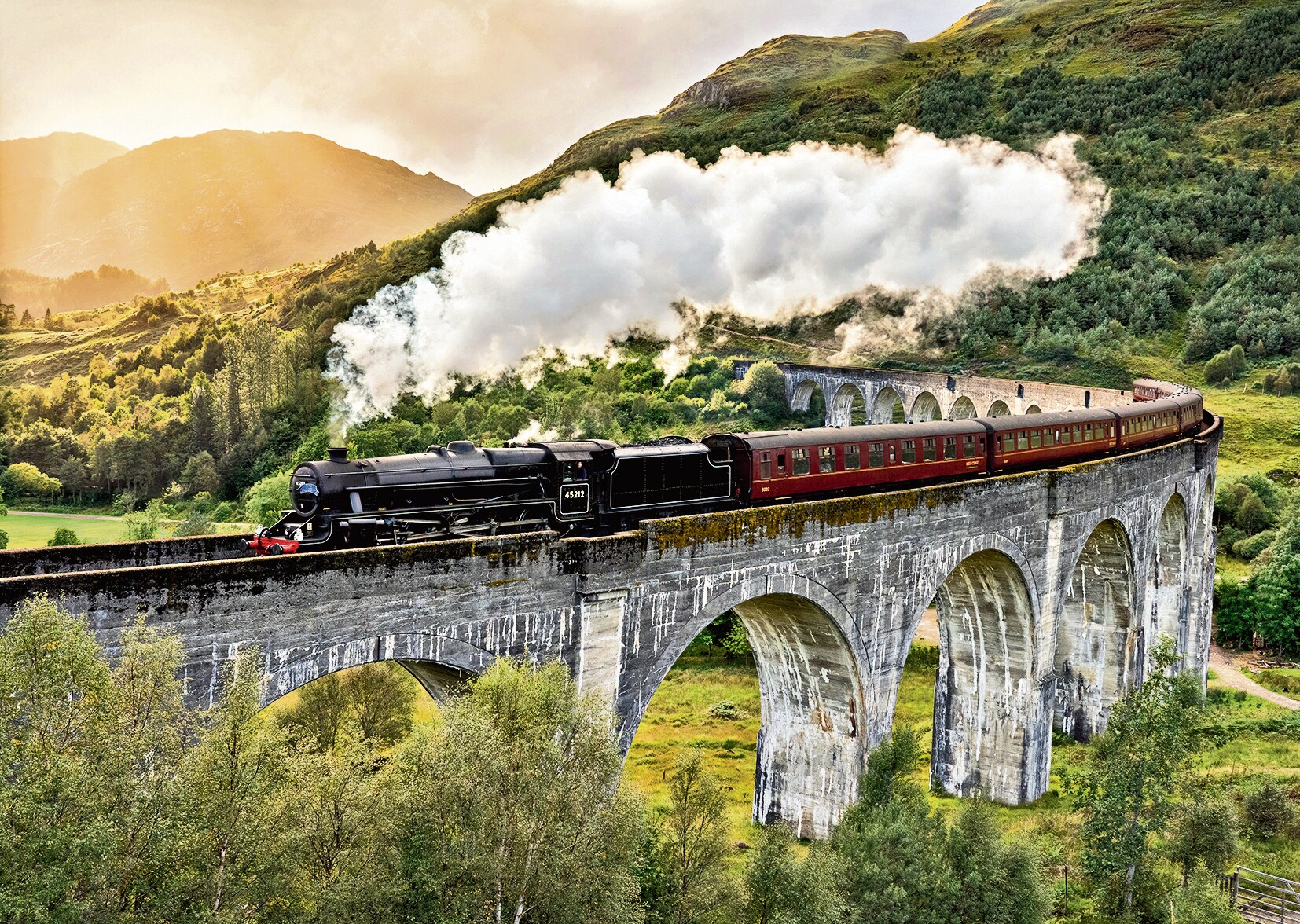 A steam locomotive in the Scottish Highlands. (Adobe Stock) A steam locomotive in the Scottish Highlands. (Adobe Stock)