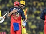 Royal Challengers Bengaluru's Virat Kohli hugs Chennai Super Kings' MS Dhoni (C) at the end of the Indian Premier League (IPL) Twenty20 cricket match between Chennai Super Kings and Royal Challengers Bengaluru Royal Challengers Bengaluru's Virat Kohli hugs Chennai Super Kings' MS Dhoni (C) at the end of the Indian Premier League (IPL) Twenty20 cricket match between Chennai Super Kings and Royal Challengers Bengaluru