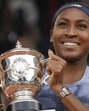 Coco Gauff of the US celebrates with the trophy after winning the French Open final against Aryna Sabalenka of Belarus at the Roland Garros on Saturday. (AP)
