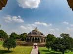People out on a hot day at Humayun’s Tomb in New Delhi on Friday. (RAJ K RAJ /HT PHOTO)
