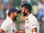 Rohit Sharma and Cheteshwar Pujara during a Test match for India. Rohit Sharma and Cheteshwar Pujara during a Test match for India.