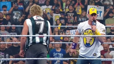 John Cena and Logan Paul in action. John Cena and Logan Paul in action.