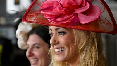 Abby Hornacek and Samantha Honig, both from New York, enjoyed the festivities from the grandstand on Saturday, June 7, 2025, before the 157th running of the Belmont Stakes in Saratoga Springs. (AP Photo/Jessica Hill) (AP) Abby Hornacek and Samantha Honig, both from New York, enjoyed the festivities from the grandstand on Saturday, June 7, 2025, before the 157th running of the Belmont Stakes in Saratoga Springs. (AP Photo/Jessica Hill) (AP)