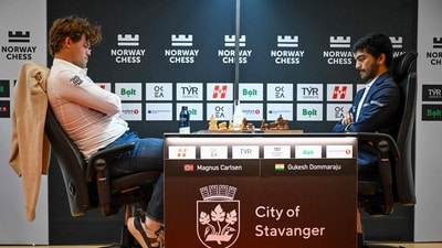 Norway's Magnus Carlsen (L) plays against India's D Gukesh. (AFP) Norway's Magnus Carlsen (L) plays against India's D Gukesh. (AFP)