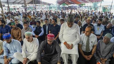 Jammu and Kashmir chief minister Omar Abdullah, his father and National Conference president Farooq Abdullah and others offering ‘namaz’ at Hazratbal shrine on the outskirts of Srinagar on Eid-ul-Azha on Saturday. (PTI Photo) Jammu and Kashmir chief minister Omar Abdullah, his father and National Conference president Farooq Abdullah and others offering ‘namaz’ at Hazratbal shrine on the outskirts of Srinagar on Eid-ul-Azha on Saturday. (PTI Photo)